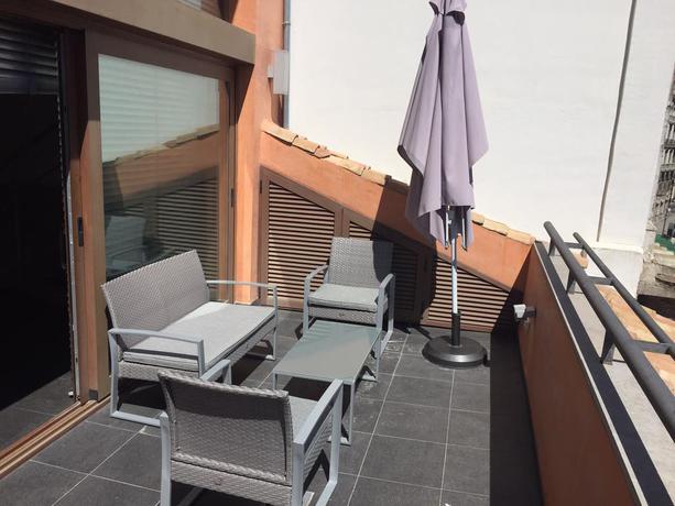 Imagen de la habitación del Apartamentos La Perla Reyes Catolicos Living. Foto 8
