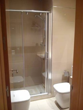Imagen de la habitación del Apartamentos La Perla Reyes Catolicos Living. Foto 10