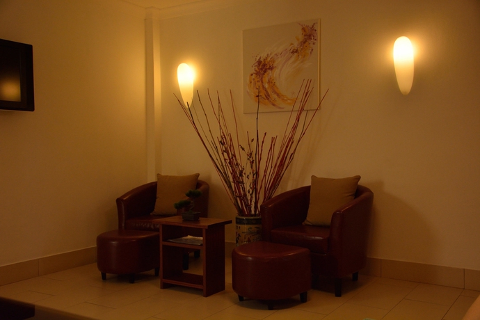 Imagen de la habitación del Apartamentos La Pointe Villas. Foto 3