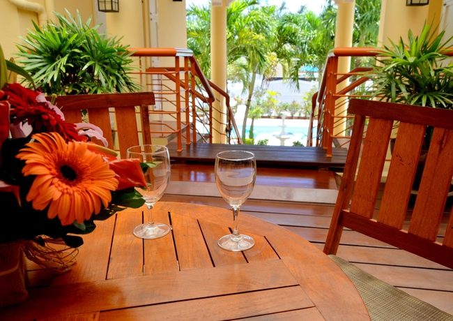 Imagen de la habitación del Apartamentos La Pointe Villas. Foto 6