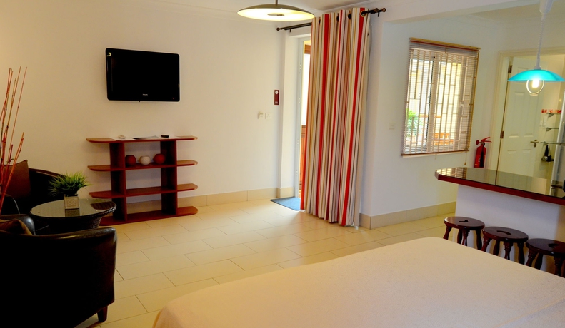 Imagen de la habitación del Apartamentos La Pointe Villas. Foto 7