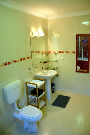 Imagen de la habitación del Apartamentos La Pointe Villas. Foto 10