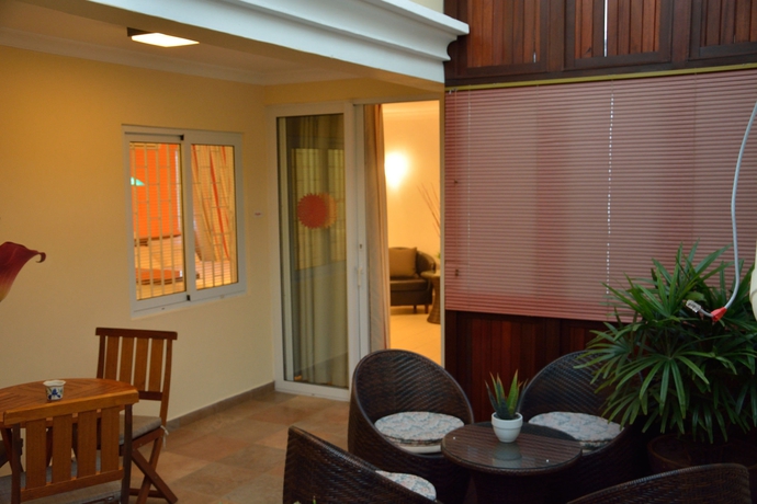 Imagen de la habitación del Apartamentos La Pointe Villas. Foto 12