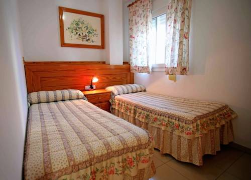 Imagen de la habitación del Apartamentos La Proa. Foto 9