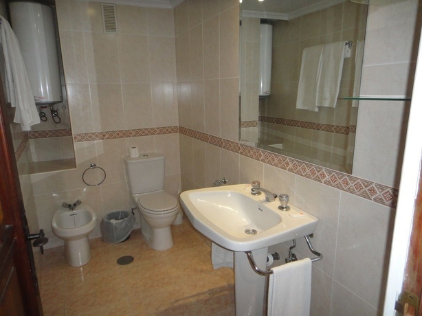 Imagen de la habitación del Apartamentos La Roca Rentals. Foto 8