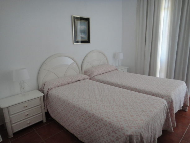 Imagen de la habitación del Apartamentos La Roca Rentals. Foto 11