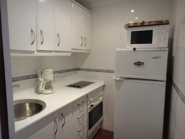 Imagen de la habitación del Apartamentos La Roca Rentals. Foto 13