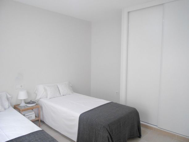 Imagen de la habitación del Apartamentos La Rosita Old Town. Foto 13