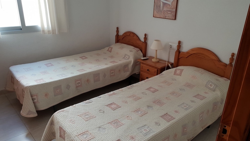 Imagen de la habitación del Apartamentos La Rotonda Aparthotel. Foto 8