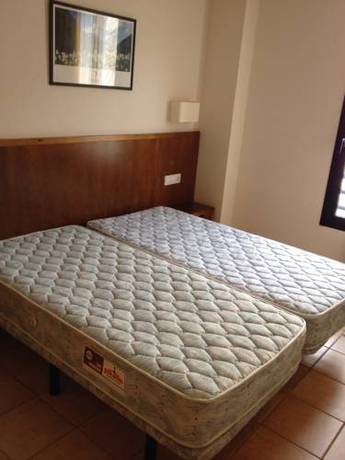 Imagen de la habitación del Apartamentos La Serrera. Foto 30