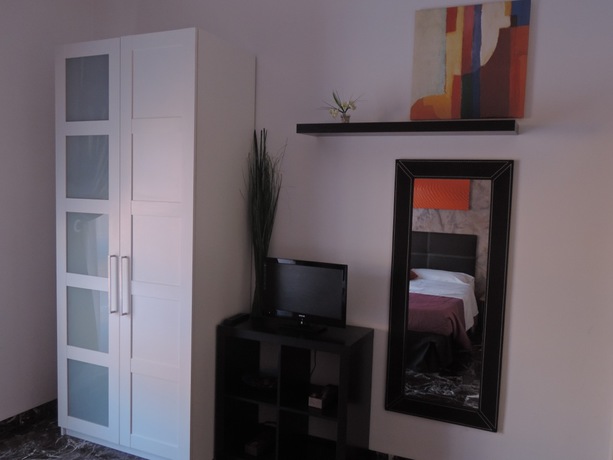 Imagen de la habitación del Apartamentos La Suite B&B. Foto 13