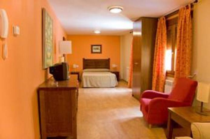 Imagen de la habitación del Apartamentos La Trufa Negra. Foto 6