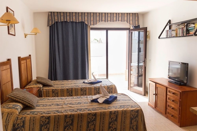 Imagen de la habitación del Apartamentos Las Lilas. Foto 5