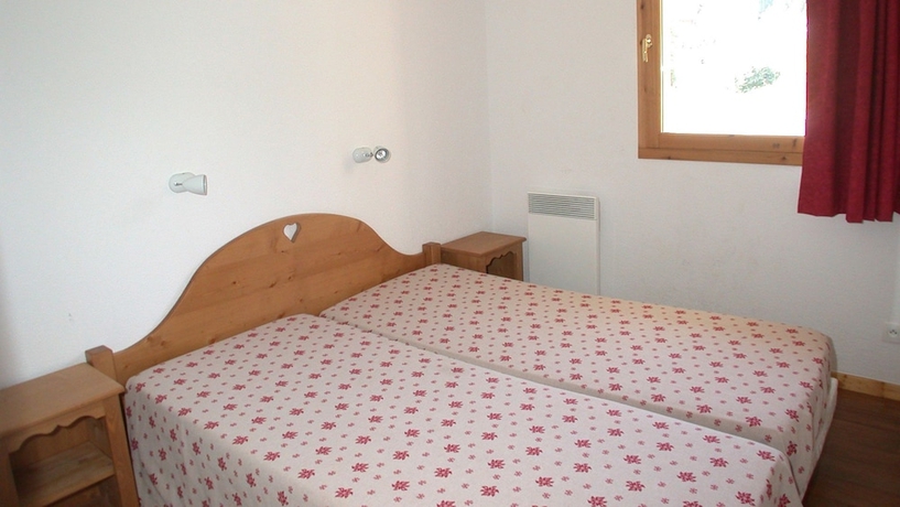 Imagen de la habitación del Apartamentos L'ecrin Des Neiges. Foto 5
