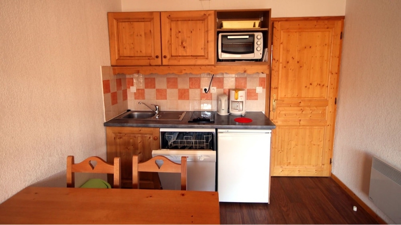 Imagen de la habitación del Apartamentos L'ecrin Des Neiges. Foto 7