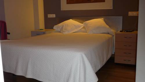 Imagen de la habitación del Apartamentos León, León. Foto 5