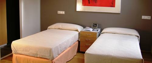 Imagen de la habitación del Apartamentos León, León. Foto 8