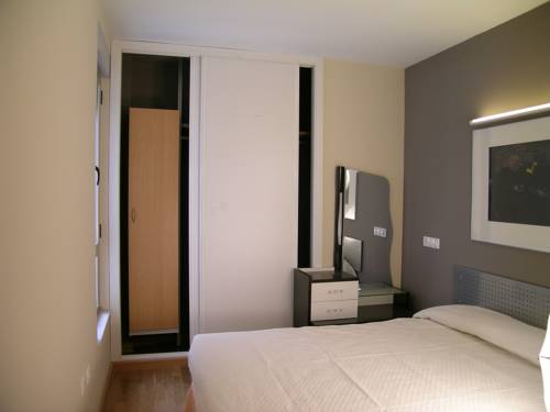 Imagen de la habitación del Apartamentos León, León. Foto 9