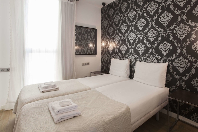 Imagen de la habitación del Apartamentos Liceu by gaiarooms. Foto 6