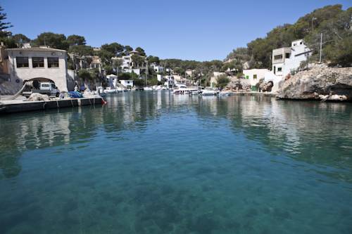 Imagen de los exteriores del Apartamentos Llevant, Cala Santanyi. Foto 12