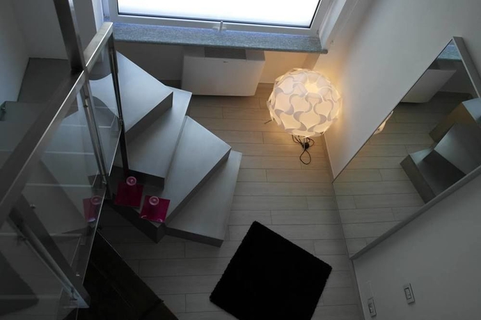 Imagen de la habitación del Apartamentos Locanda Borgo Vecchio. Foto 2