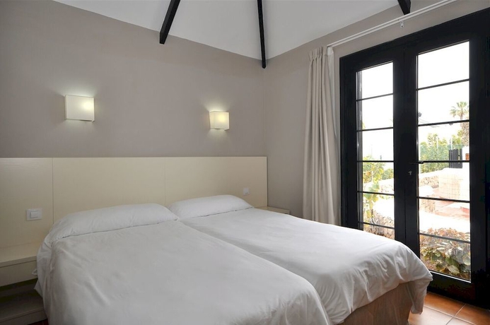 Imagen de la habitación del Apartamentos Los Cardones Boutique Village. Foto 1