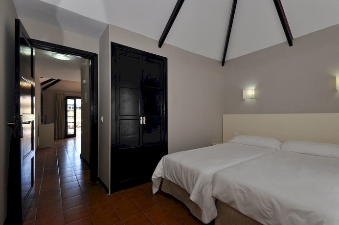 Imagen de la habitación del Apartamentos Los Cardones Boutique Village. Foto 4