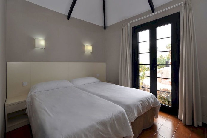 Imagen de la habitación del Apartamentos Los Cardones Boutique Village. Foto 5