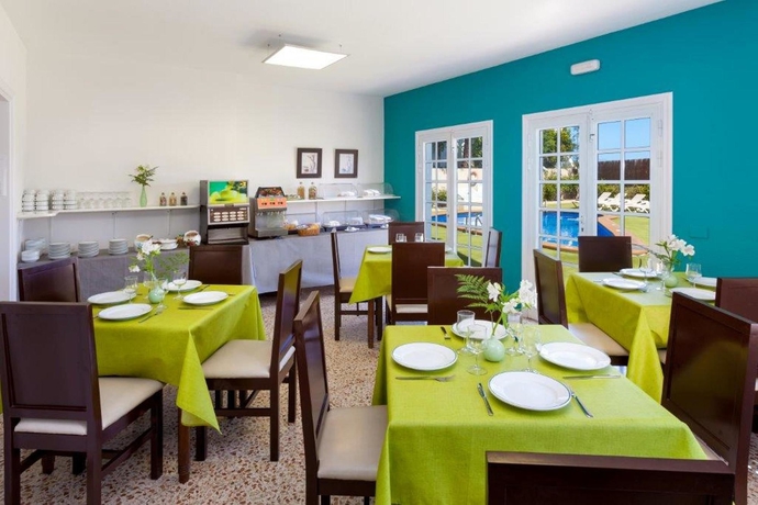 Imagen del bar/restaurante del Apartamentos Los Dragos del Norte. Foto 2