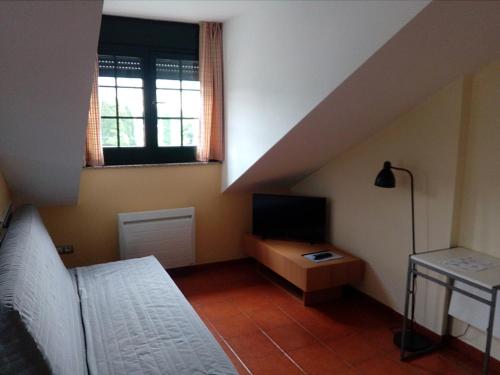 Imagen de la habitación del Apartamentos Luarca. Foto 10