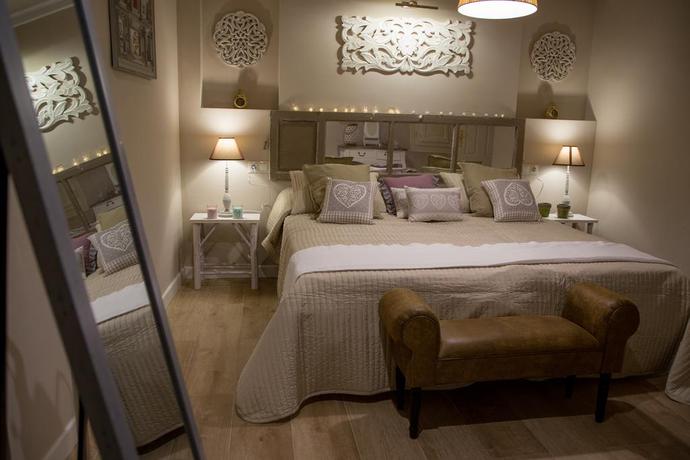 Imagen de la habitación del Apartamentos Luna Suites Palacio Almagra. Foto 6
