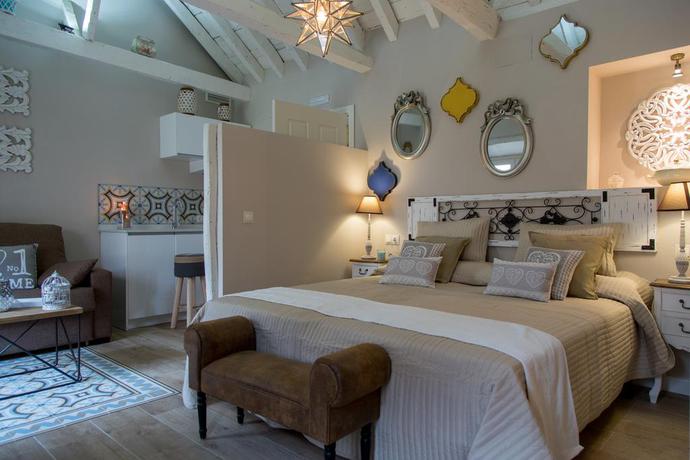 Imagen de la habitación del Apartamentos Luna Suites Palacio Almagra. Foto 8