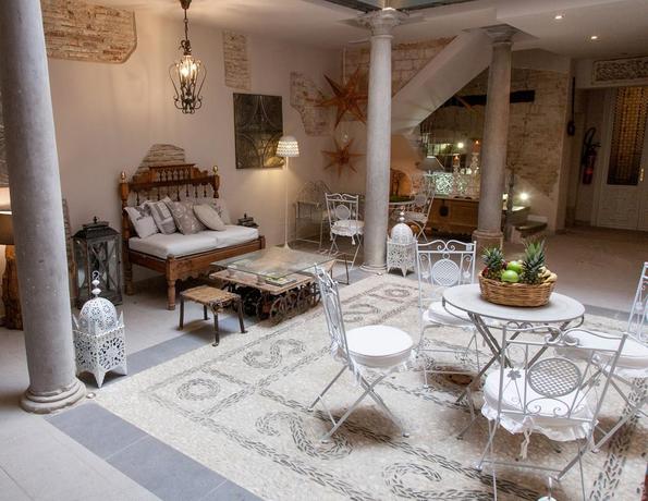 Imagen de la habitación del Apartamentos Luna Suites Palacio Almagra. Foto 9