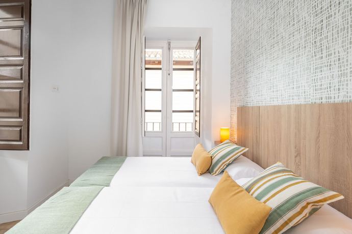 Imagen de la habitación del Apartamentos Luna Suites Palacio Dorita. Foto 5