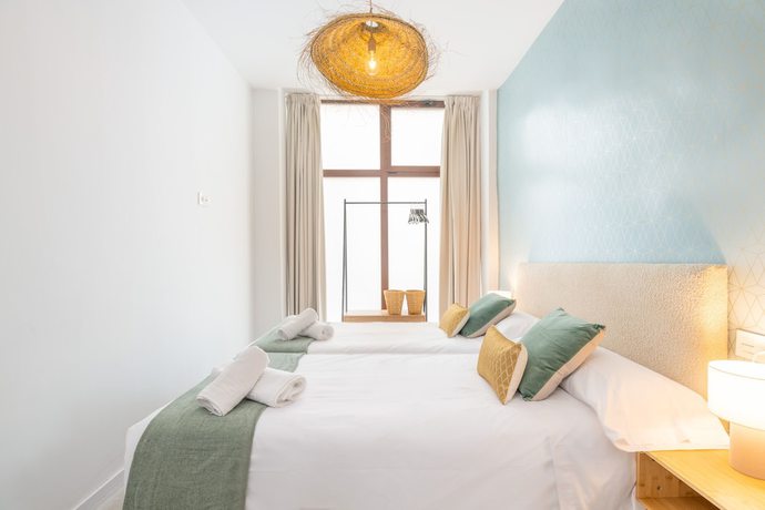 Imagen de la habitación del Apartamentos Luna Suites Palacio Dorita. Foto 7