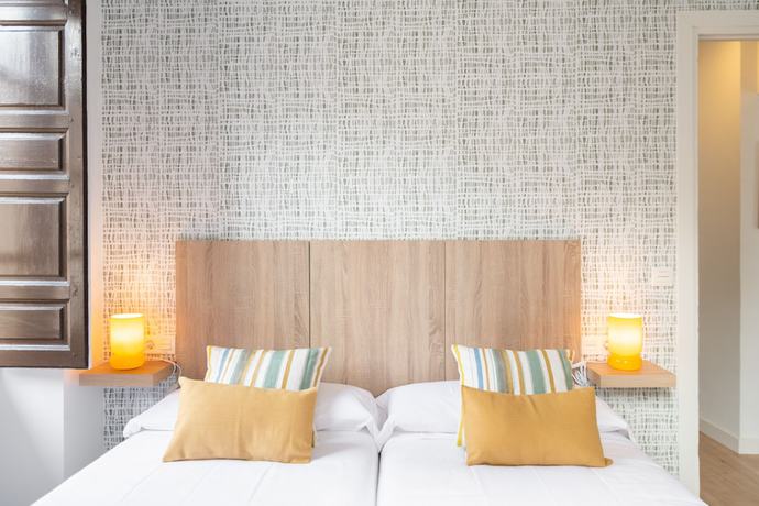 Imagen de la habitación del Apartamentos Luna Suites Palacio Dorita. Foto 10