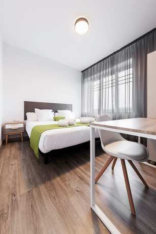 Imagen de la habitación del Apartamentos Lux Apartamentos Santiago. Foto 4