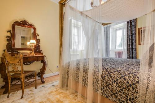 Imagen de la habitación del Apartamentos Luxa Charmhouse Hotel. Foto 8