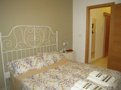 Imagen de la habitación del Apartamentos MALAMA Apartamentos Turísticos. Foto 10