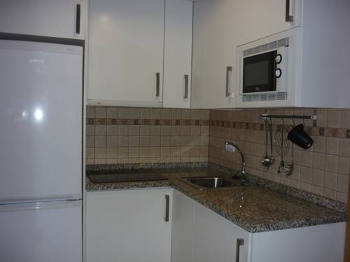 Imagen de la habitación del Apartamentos MALAMA Apartamentos Turísticos. Foto 12