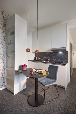 Imagen de la habitación del Apartamentos MASEVEN Frankfurt Messe. Foto 3