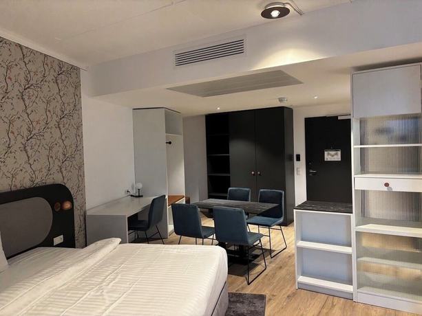 Imagen de la habitación del Apartamentos MASEVEN Frankfurt Messe. Foto 18