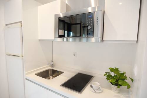Imagen de la habitación del Apartamentos Macarena Home. Foto 3