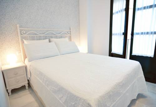 Imagen de la habitación del Apartamentos Macarena Home. Foto 4
