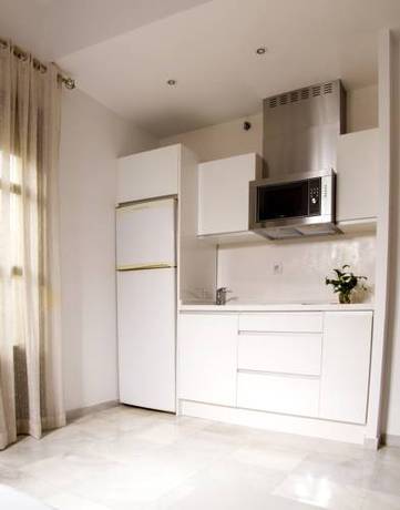 Imagen de la habitación del Apartamentos Macarena Home. Foto 5