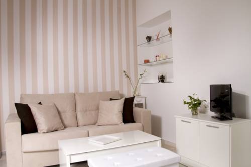 Imagen de la habitación del Apartamentos Macarena Home. Foto 7