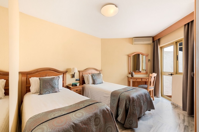 Imagen de la habitación del Apartamentos Macdonald Leila Playa Resort. Foto 5