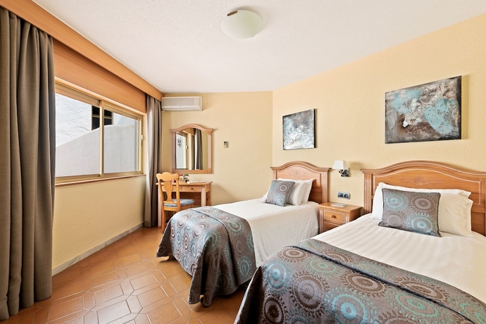 Imagen de la habitación del Apartamentos Macdonald Leila Playa Resort. Foto 8