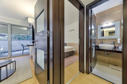 Imagen de la habitación del Apartamentos Madison Luxury Apartments and Rooms. Foto 7