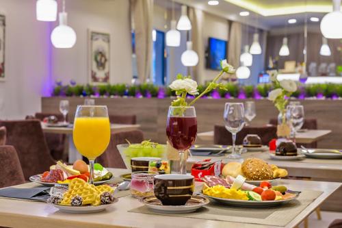 Imagen del bar/restaurante del Apartamentos Madison Luxury Apartments and Rooms. Foto 2